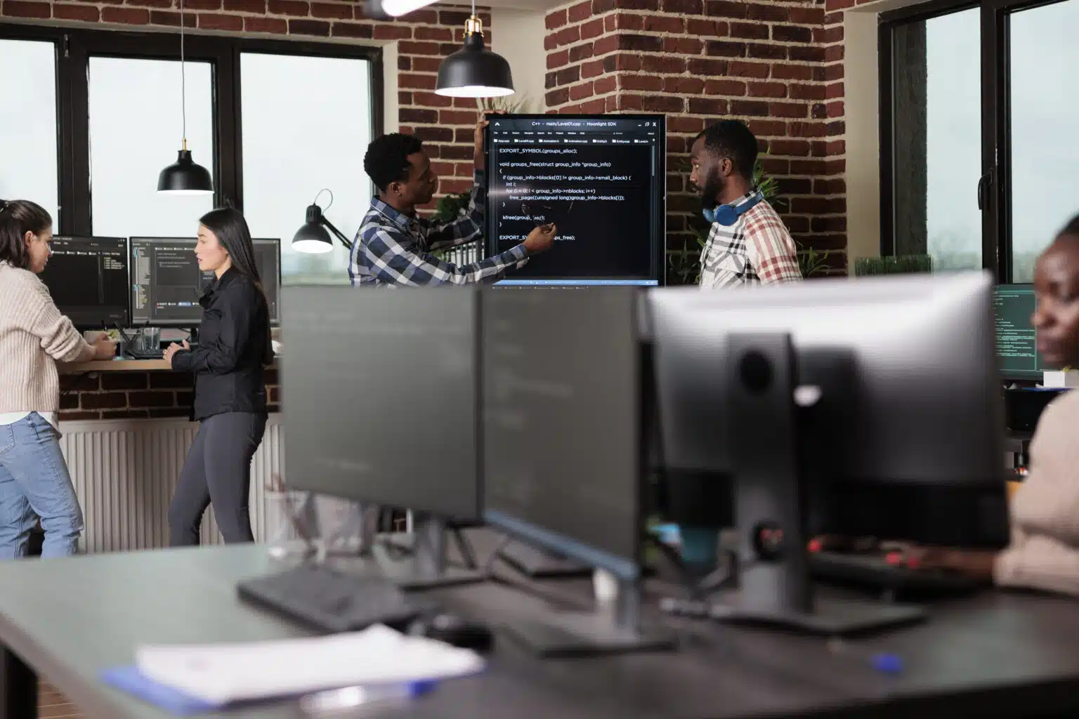 Our team of engineers working in a futuristic warehouse office